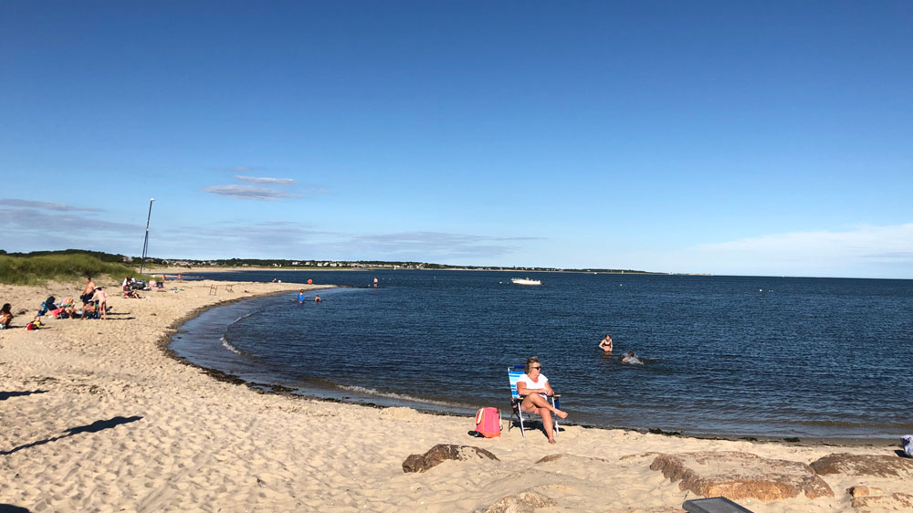 People relax on the shores of Forest Beach in Chatham, Cape Cod.