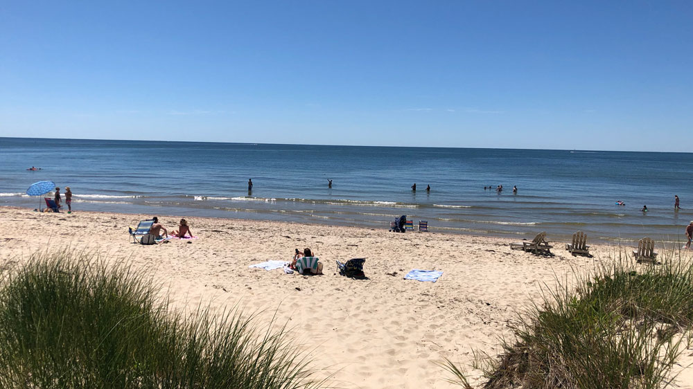 Swimmers enjoy the water at Metcalf Memorial Beach in Dennis, Cape Cod.
