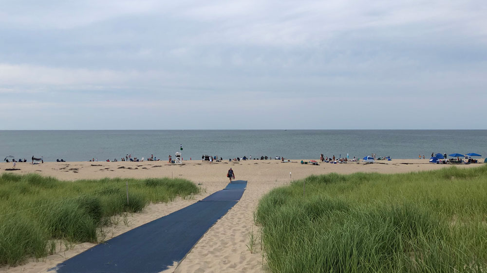 Crowds line the shore of Race Point Beach in Provincetown, Cape Cod.