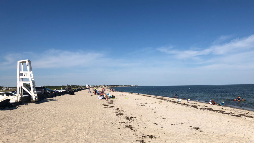 Lifeguard towers line the shore of West Dennis Beach in Dennis, Cape Cod.