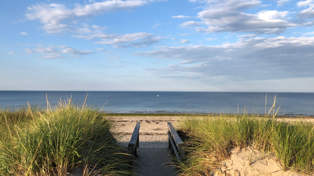 A pathway through the dunes leads to Phillips Road Beach in Bourne, Cape Cod.